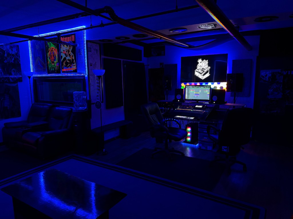 Neon Paperkutz sign and photo wall